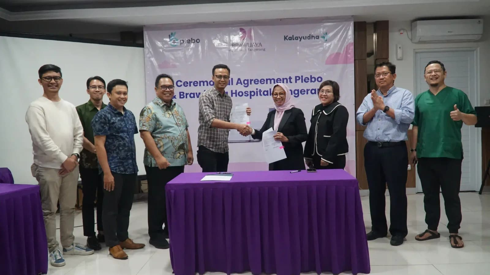 Kalayudha and partners at a hospital partnership signing ceremony